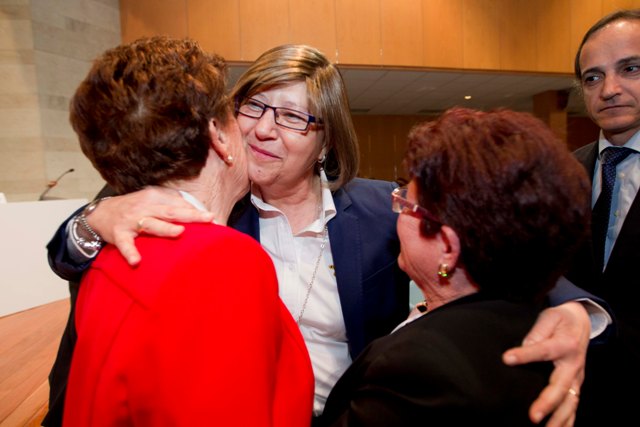 Conselleira con homeaxeadas